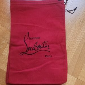 Christian Louboutin Red Dust Bag. Five matching dust bags